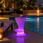 Estella Illuminated Bar Stool — LED bar stool in White Stone glowing at a rooftop bar