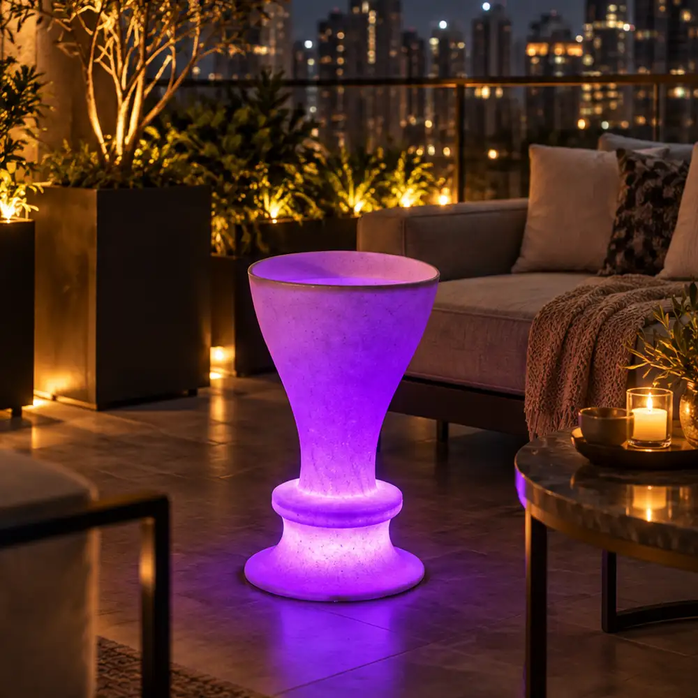 Estella Illuminated Bar Stool — LED bar stool in White Stone glowing at a rooftop bar