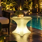 Tulum Illuminated Table — LED outdoor garden table in White Stone glowing at night
