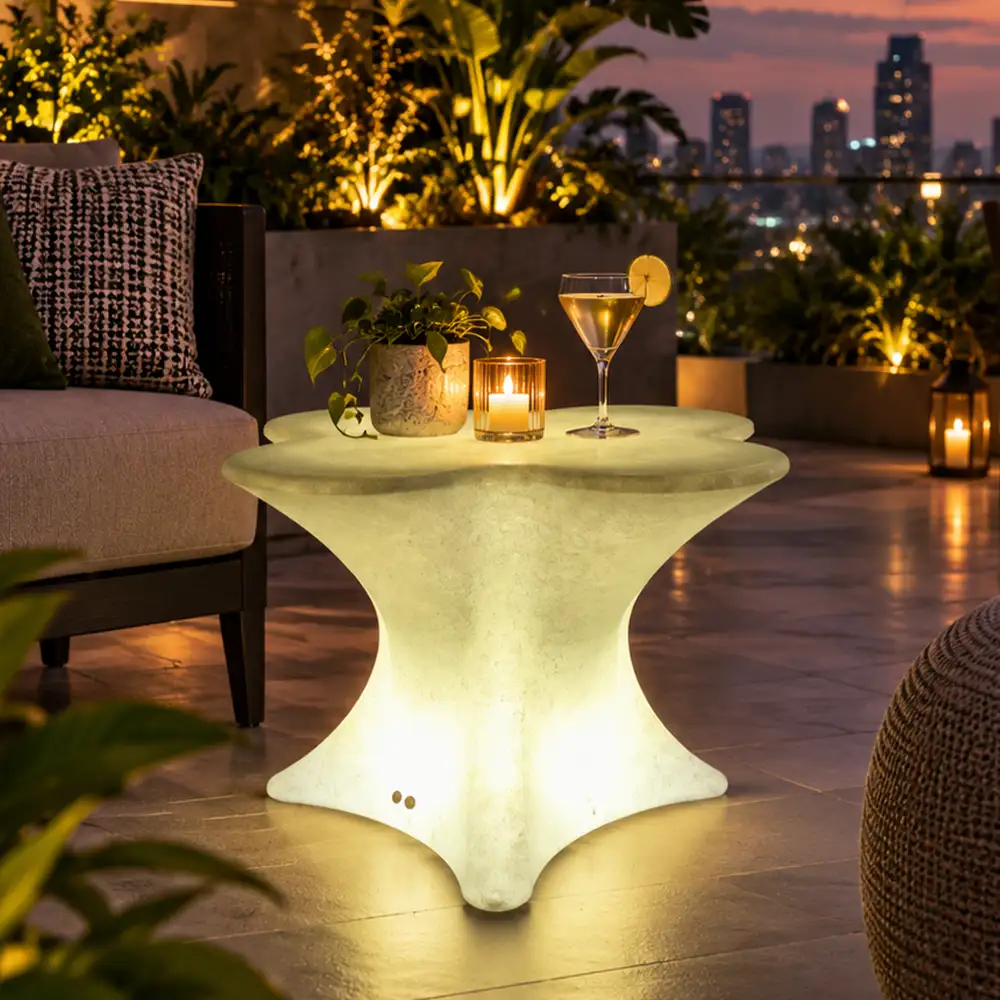 Tulum Illuminated Table — LED outdoor garden table in White Stone glowing at night