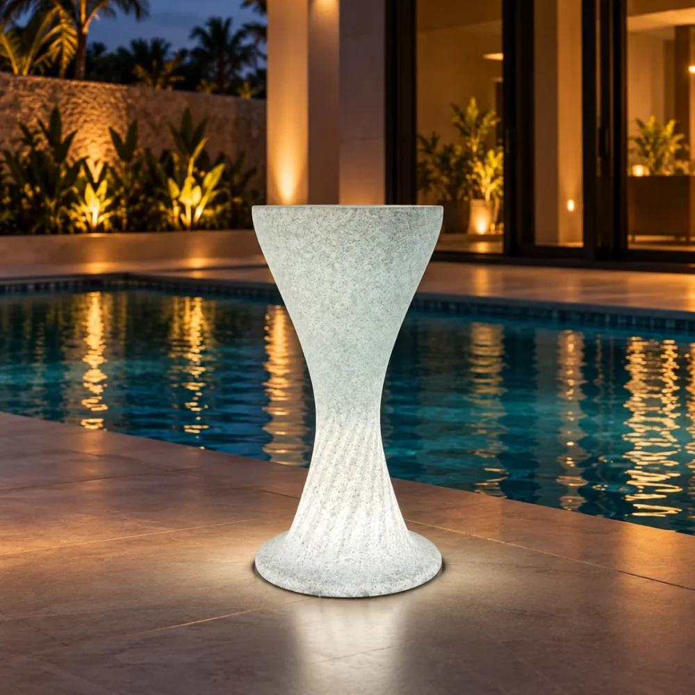 Sirocco Illuminated Bar Table, LED bar table in White Stone glowing on a rooftop terrace