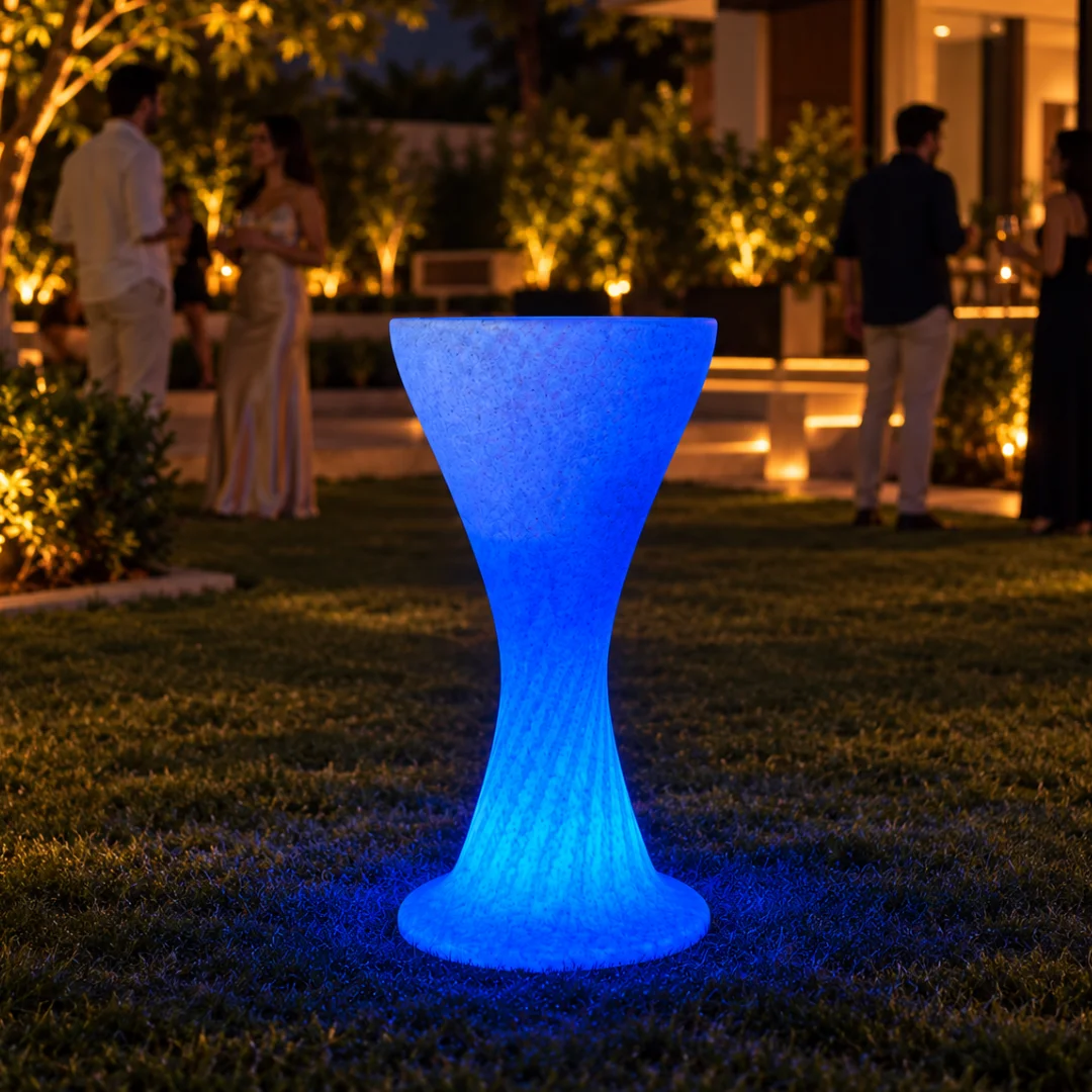 Sirocco Illuminated Bar Table, LED bar table in White Stone glowing on a rooftop terrace